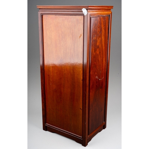 160 - A late 20th / early 21st century Chinese hardwood jewellery chest of eight drawers of narrow proport... 