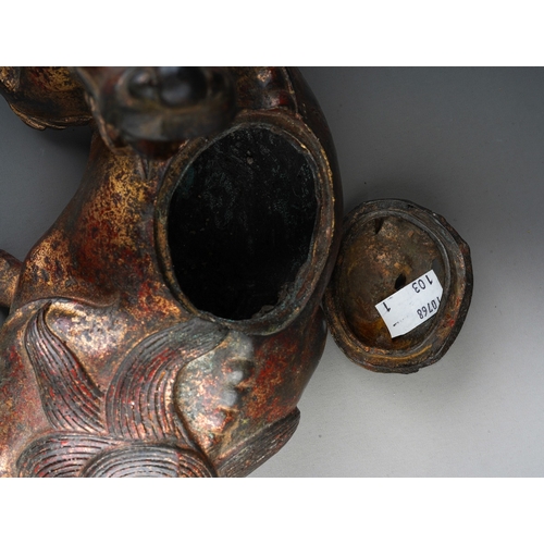 162 - A Japanese cast bronze koro in the form of a reclining Kirin, pierced cover, unsigned, height 16cm x... 