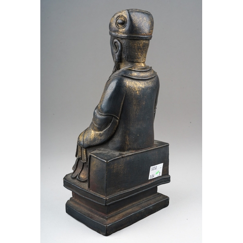 163 - A Chinese bronze figure of a seated official, worn gilding, height 24cm