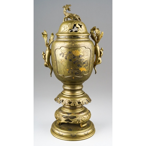 165 - A Japanese Meiji period (1868-1912) gilt bronze koro with cover on stand, with mythical beast to dom... 