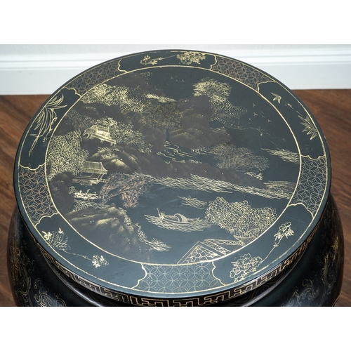 169 - A Chinese black lacquered and gilt papier mache display table, of circular form, wavy apron, on five... 