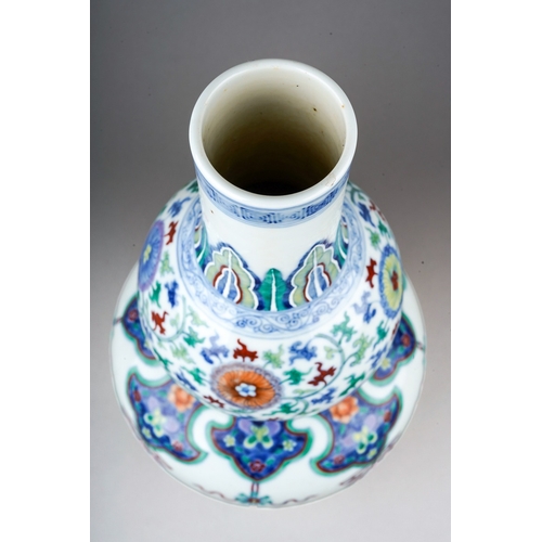 171 - A Chinese Doucai porcelain double gourd vase, decorated with alternating hanging Shou symbols and ta... 