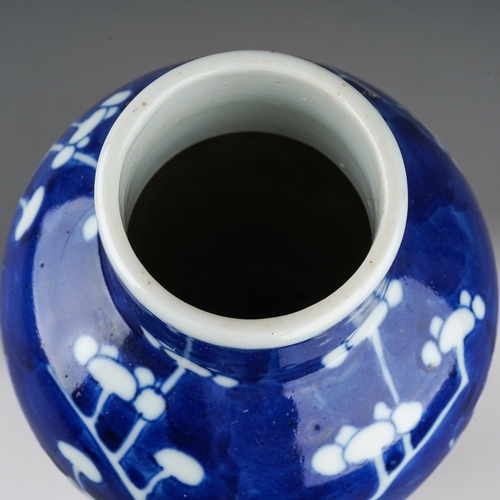 172 - A 19th century Chinese porcelain baluster vase decorated with pruus blossom, four character mark to ... 