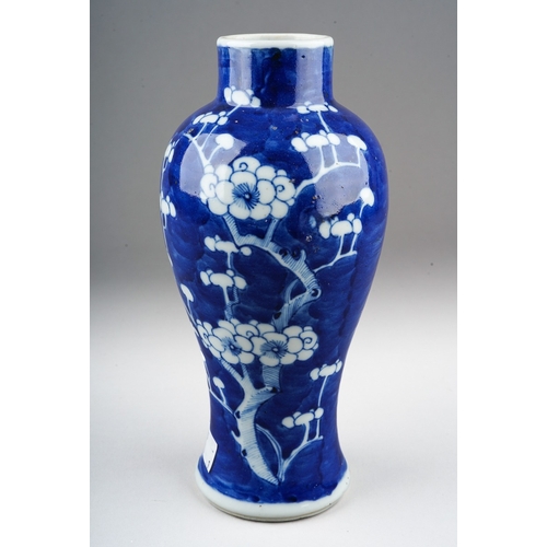 172 - A 19th century Chinese porcelain baluster vase decorated with pruus blossom, four character mark to ... 