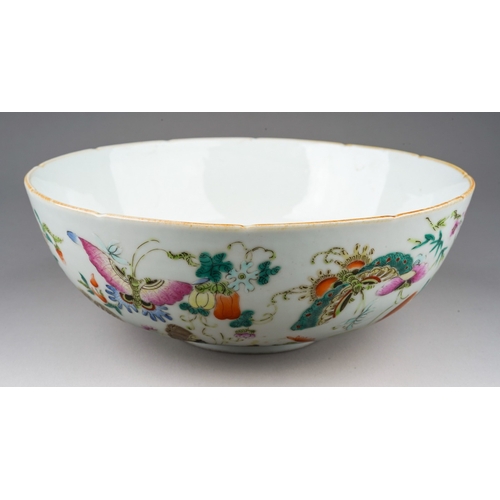 176 - A Chinese famille rose bowl, the interior enamelled to the centre with a single butterfly in a borde... 