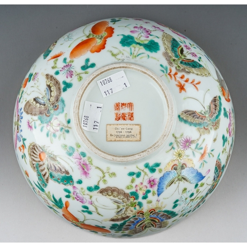 176 - A Chinese famille rose bowl, the interior enamelled to the centre with a single butterfly in a borde... 
