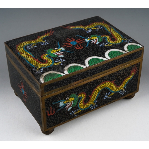 201 - A 20th century Chinese cloisonne rectangular box with pull off cover, the black ground decorated wit... 