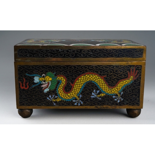 201 - A 20th century Chinese cloisonne rectangular box with pull off cover, the black ground decorated wit... 