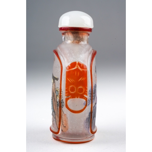 205 - A 20th century Chinese glass snuff bottle, reverse painted with a seated female and a bird on a rock... 