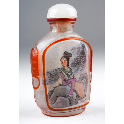 205 - A 20th century Chinese glass snuff bottle, reverse painted with a seated female and a bird on a rock... 