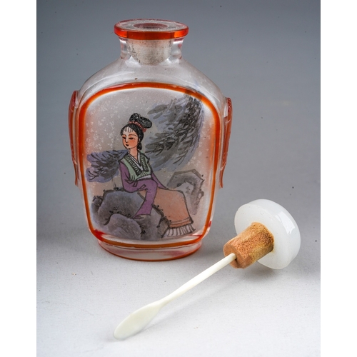 205 - A 20th century Chinese glass snuff bottle, reverse painted with a seated female and a bird on a rock... 