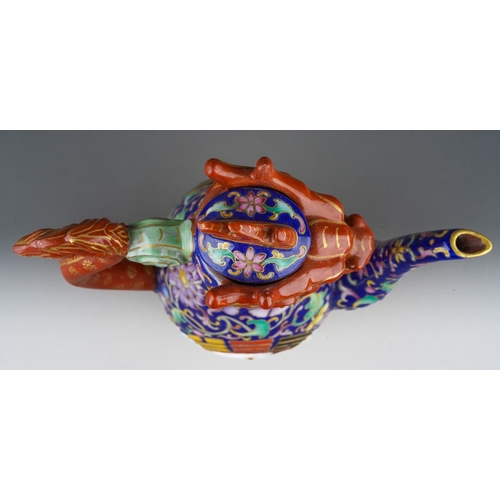 213 - A late 20th / early 21st century polychrome stoneware dragon wine pot, of baluster form, handle in t... 