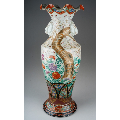 217 - A large Japanese porcelain baluster vase, with frilled rim above twin rabbit mask handles, the vase ... 