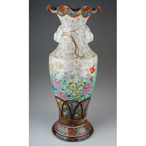 217 - A large Japanese porcelain baluster vase, with frilled rim above twin rabbit mask handles, the vase ... 