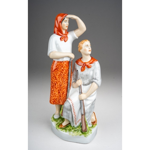 A second half 20th century Russian porcelain figure group of Voroshilov's Markswomen after a 1938 design by Natalia Danko, modelled as two women holding rifles, signed to skirt at rear and printed marks to base, height 23.5cm