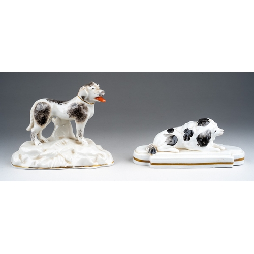 229 - Two 19th century porcelain figures of dogs, one modelled as a recumbent Cavalier spaniel on a shaped... 