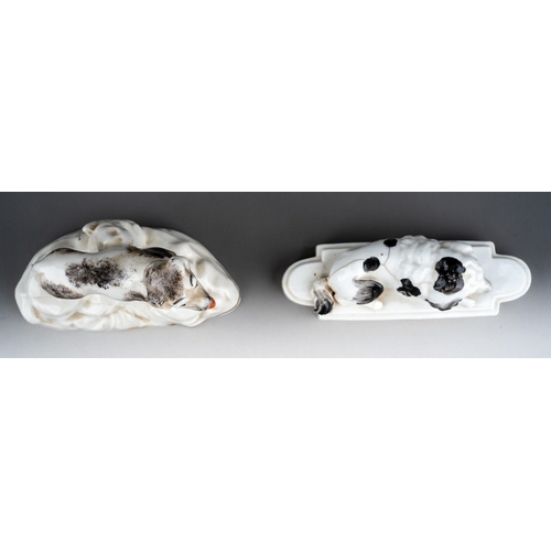 229 - Two 19th century porcelain figures of dogs, one modelled as a recumbent Cavalier spaniel on a shaped... 