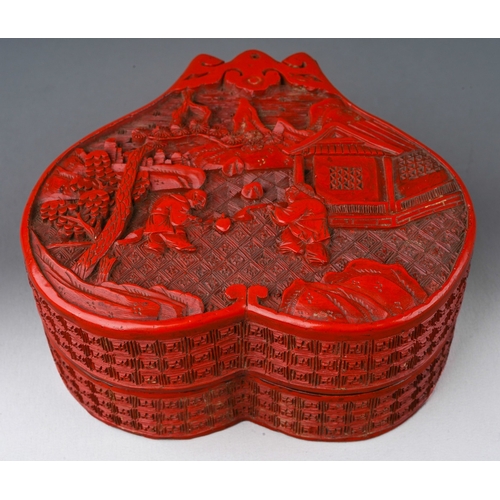 232 - A 20th century Chinese red lacquer papier mache relief decorated box and cover, the pull off cover d... 