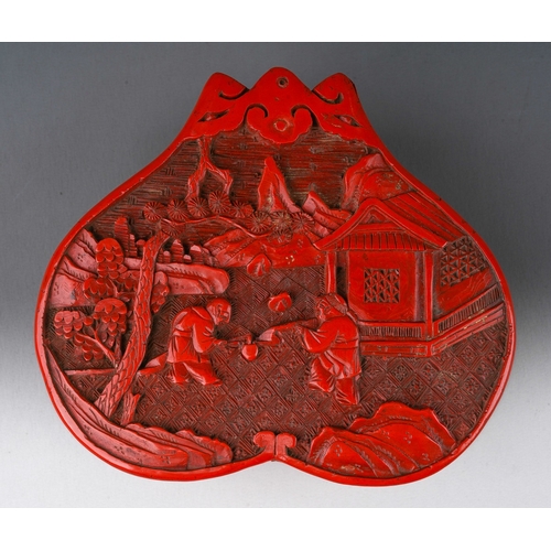 232 - A 20th century Chinese red lacquer papier mache relief decorated box and cover, the pull off cover d... 