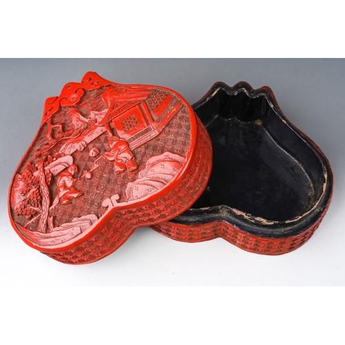 232 - A 20th century Chinese red lacquer papier mache relief decorated box and cover, the pull off cover d... 