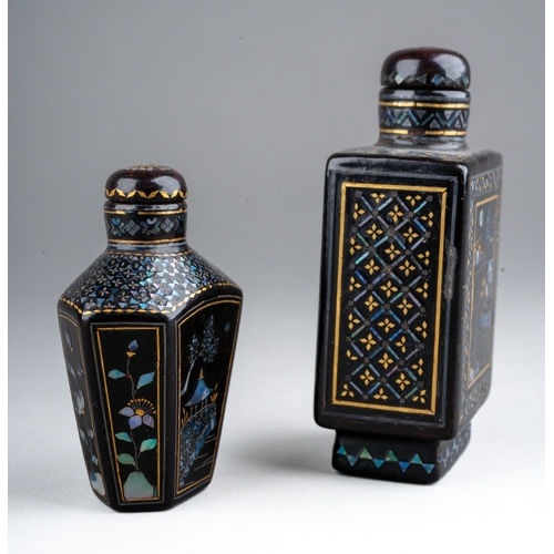 236 - Two Chinese papier mache gilt and mother of pearl inlaid snuff bottles, both with landscape scenes, ... 