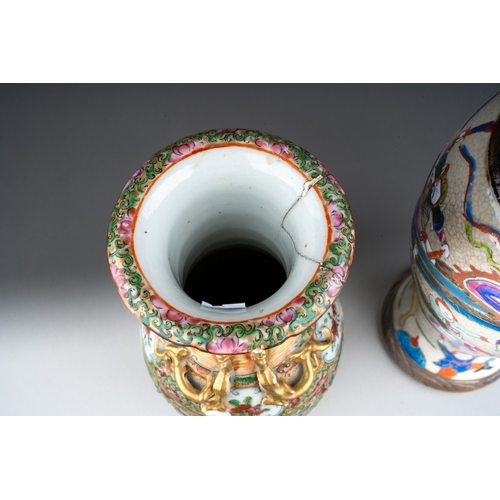 237 - A 19th century Chinese Canton famille rose twin handled baluster vase, repairs to neck and rim, larg... 