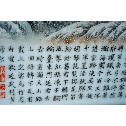 240 - A 20th century Chinese porcelain panel, painted with a snow scene of a figure by a bridge and dwelli... 