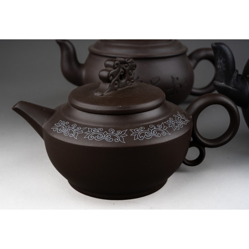 242 - A collection of five modern Chinese stoneware tea pots, all with lids, various shapes and designs, o... 