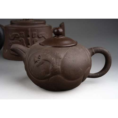 242 - A collection of five modern Chinese stoneware tea pots, all with lids, various shapes and designs, o... 