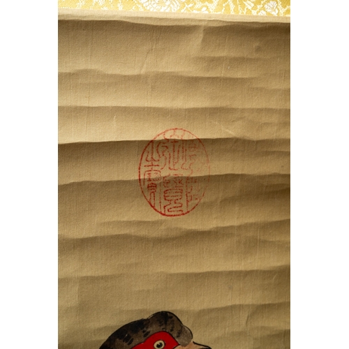 245 - A mid 20th century Chinese scroll, the silk ground painted with four birds on a rocky ledge, blue an... 