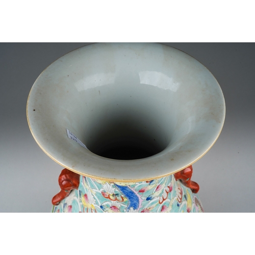 246 - A 20th century Chinese porcelain twin handled baluster vase in the Famille Rose palette, decorated w... 