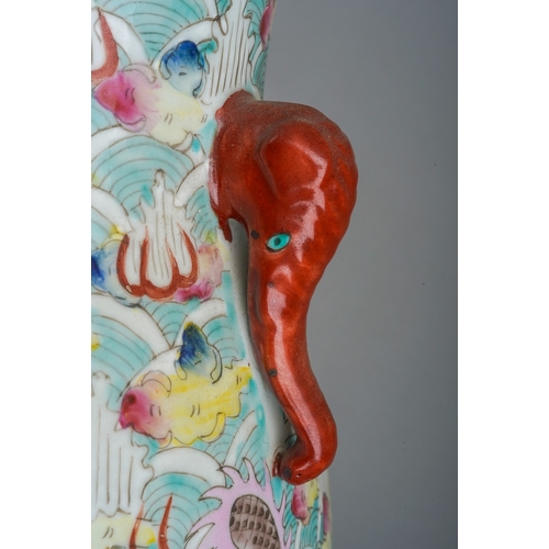 246 - A 20th century Chinese porcelain twin handled baluster vase in the Famille Rose palette, decorated w... 