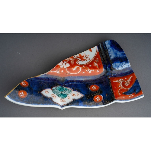 248 - A 19th century Japanese Imari bowl of panelled circular form, wavy rim, four character mark to under... 