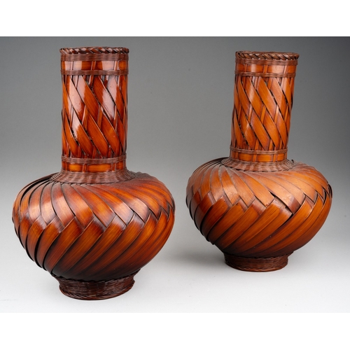 253 - A pair of modern Japanese woven wicker Ikebana style vases with ceramic liners, height 30cm (2)