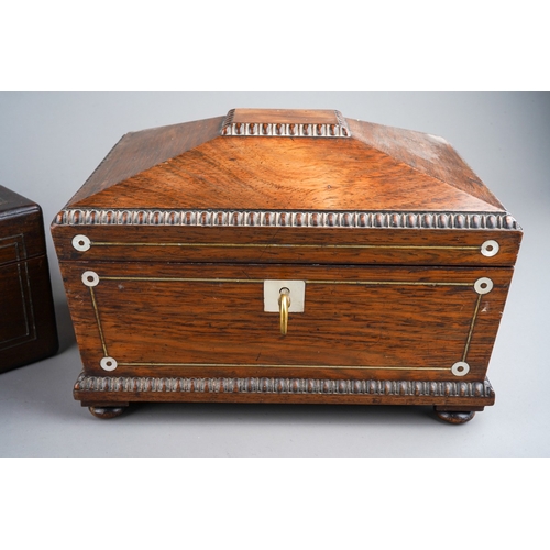 256 - An early Victorian rosewood and mother of pearl inlaid sarcophagus work box, moulded rims to the hin... 