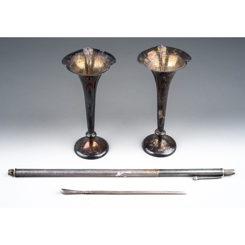 257 - A pair of Edwardian silver bud vases, crimped rims, loaded circular bases, makers James Dixon & Son,... 