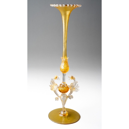 259 - A Venetian pale amber and gilt tall glass specimen vase, frilled rim, elongated slender neck to tuli... 