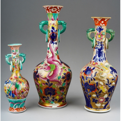 264 - Three early 19th century Miles Mason Ironstone vases of twin handled baluster form, each with flared... 