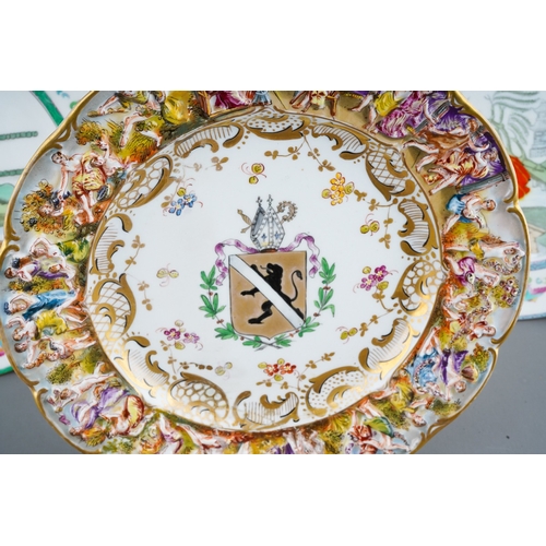 267 - A Capodimonte plate with armorial decoration to centre, diameter 25.7cm, together with two Royal Dou... 