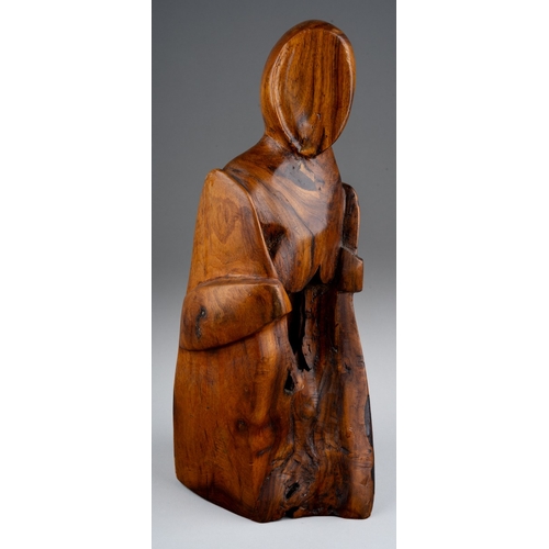 268 - Lipira -A 1970's black walnut modernistic carving of a 