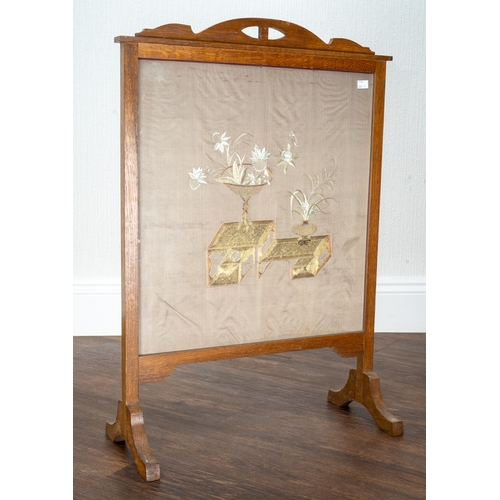 271 - An early 20th century oak framed fire screen, with Oriental embroidered silk panel, glazed, height 8... 