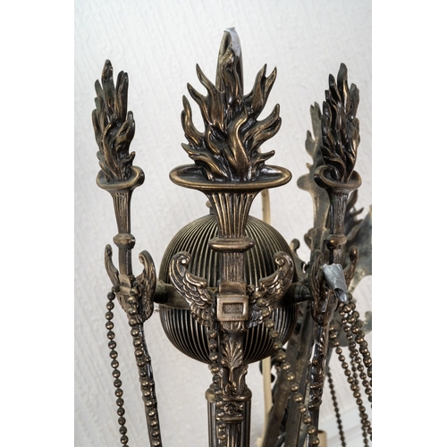 286 - A 20th century cast metal six branch electrolier, cast with flaming torch and foliate decoration, sw... 