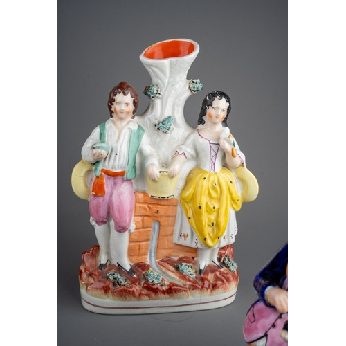 297 - Two Victorian Staffordshire pottery flat back figures,  Victorian snuff taking toby jug, a reproduct... 