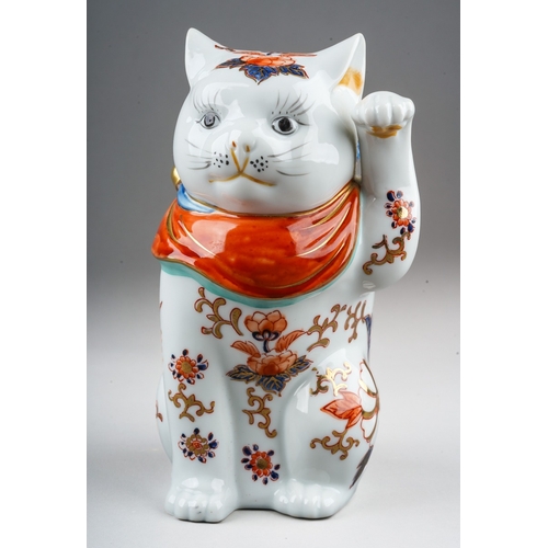 298 - A reproduction porcelain model of a lucky cat in the Imari palette, unmarked, height 18cm