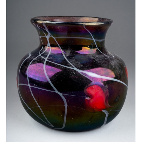 311 - A John Ditchfield iridescent glass squat baluster vase, the plum coloured glass with five red hearts... 