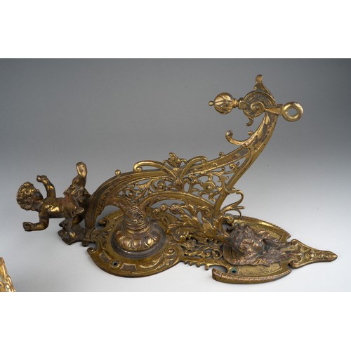 316 - A late 19th century bronze bell and wall hanging bracket, ornately cast with cherubs and scrolls, wi... 