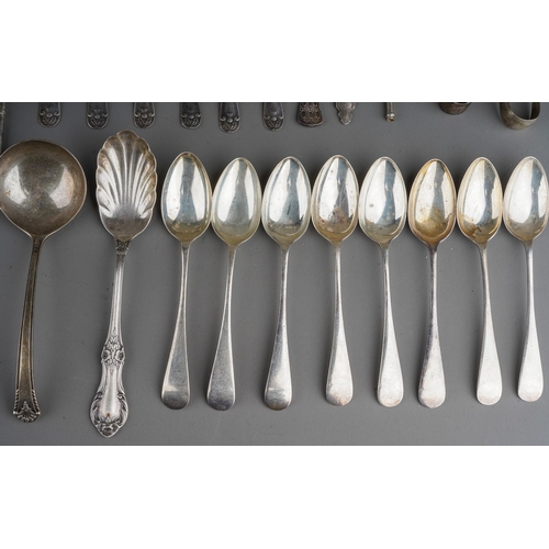 321 - A collection of silver flatware mainly teaspoons and two napkin ring, various dates and makers, gros... 