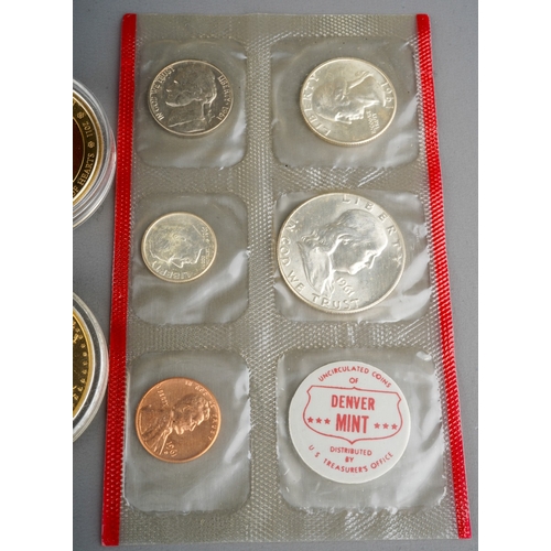 323 - A small quantity of USA coins,  including two five coin with token set of 1961 Philadelphia Mint, an... 