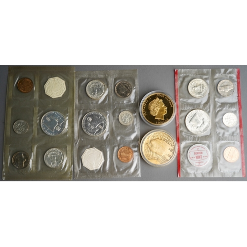 323 - A small quantity of USA coins,  including two five coin with token set of 1961 Philadelphia Mint, an... 