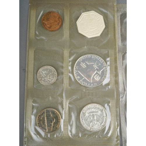 323 - A small quantity of USA coins,  including two five coin with token set of 1961 Philadelphia Mint, an... 